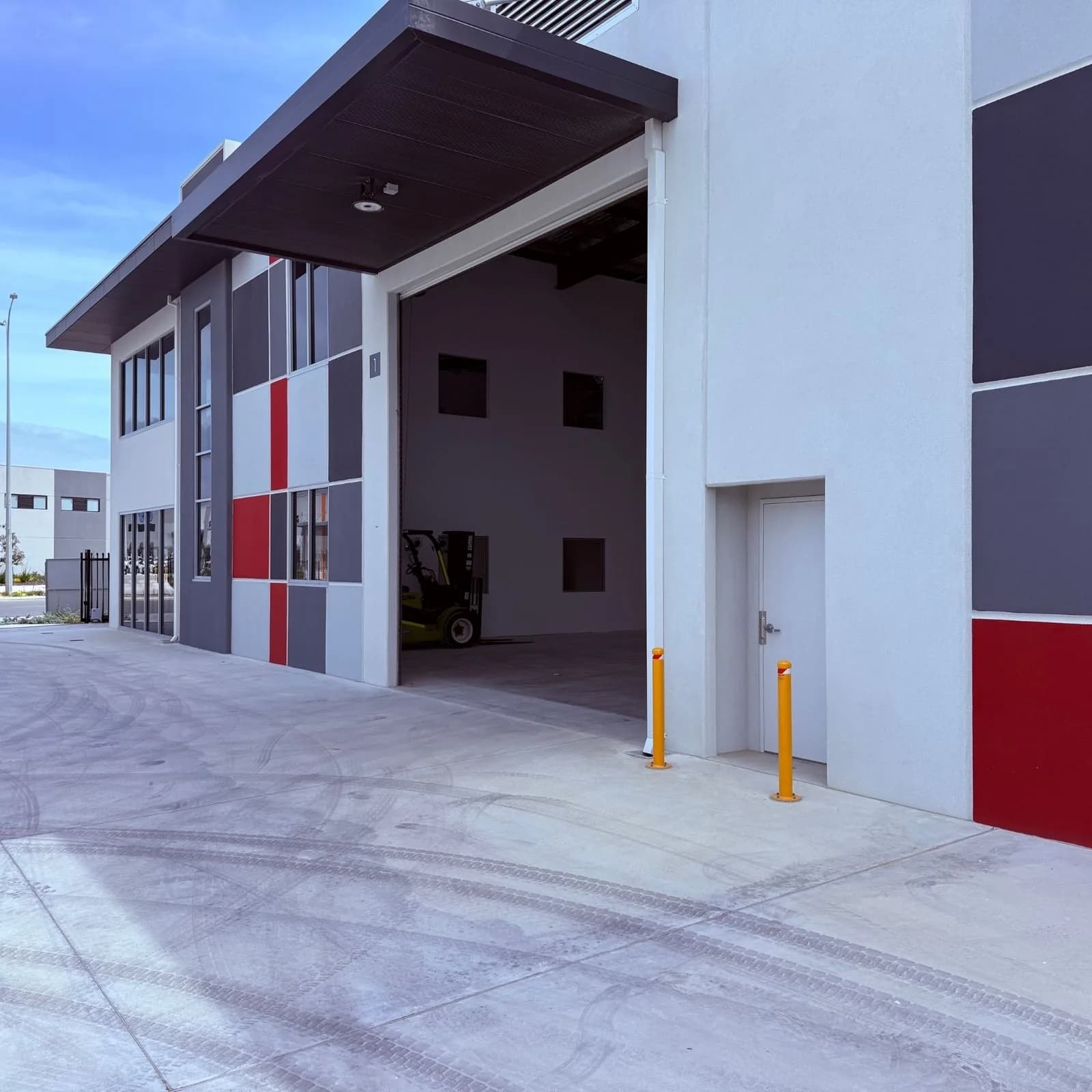 The PSW Energy Neerabup depot with its roller door open