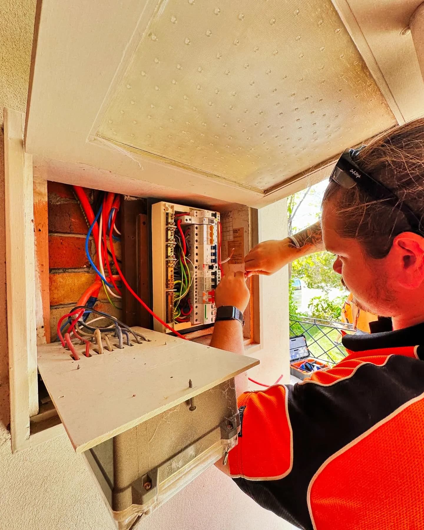 PSW technician working at a switchboard