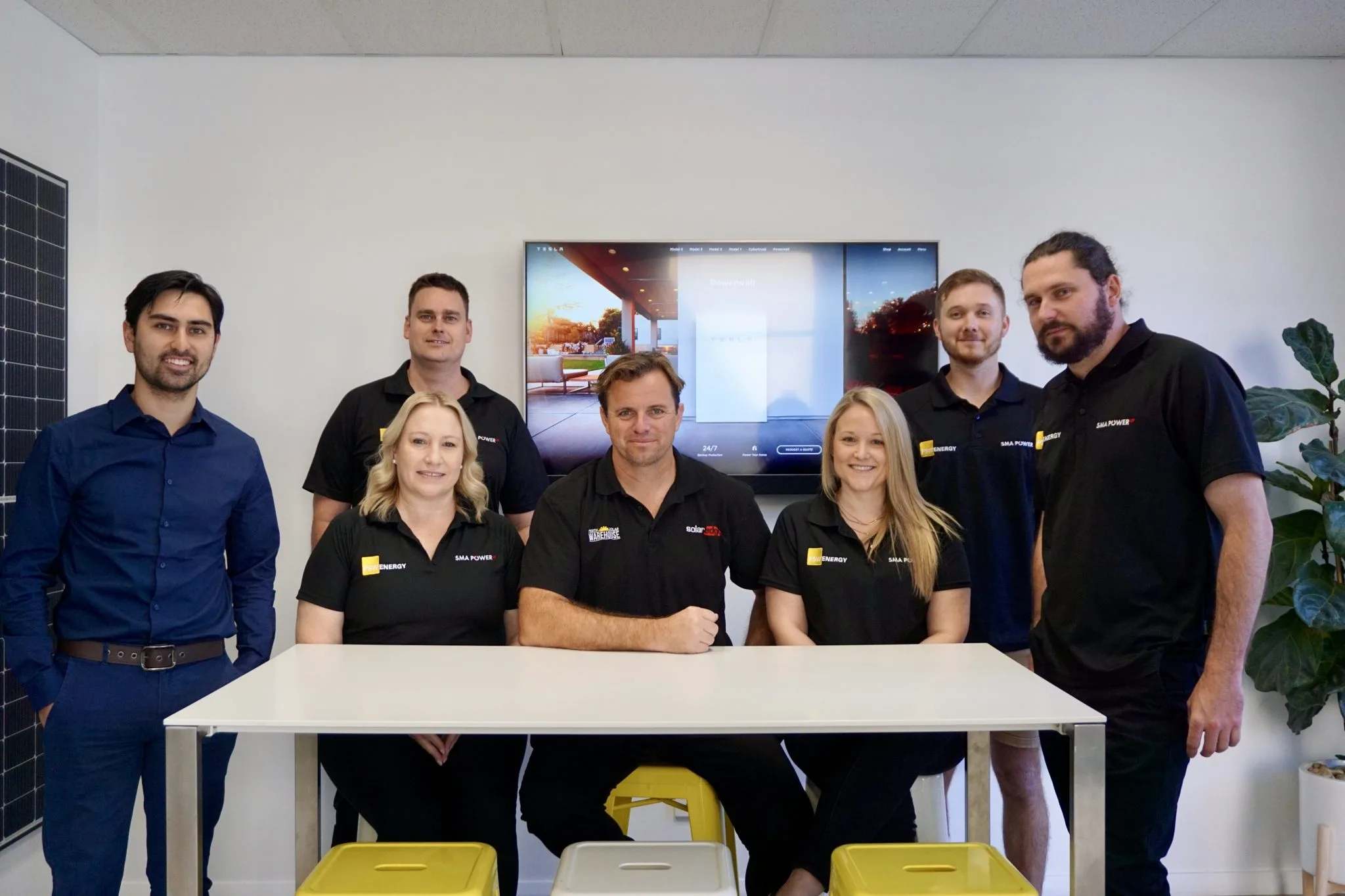 The PSW team gathered together in the showroom