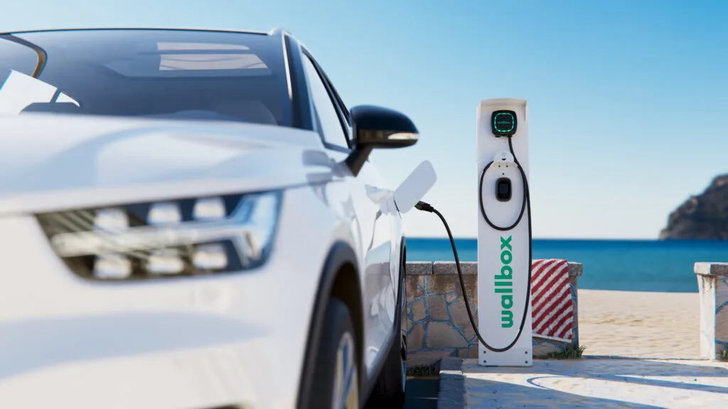 wallbox Pulsar Plus EV charger at the beach charging a Volvo electric vehicle